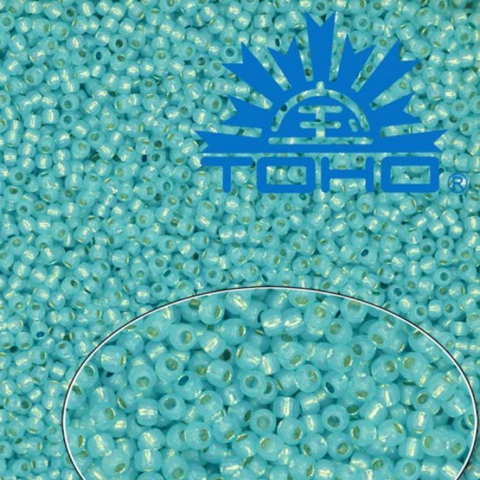 Toho Rokajl 11/0 Silver-Lined Milky Aqua č.2117 25g