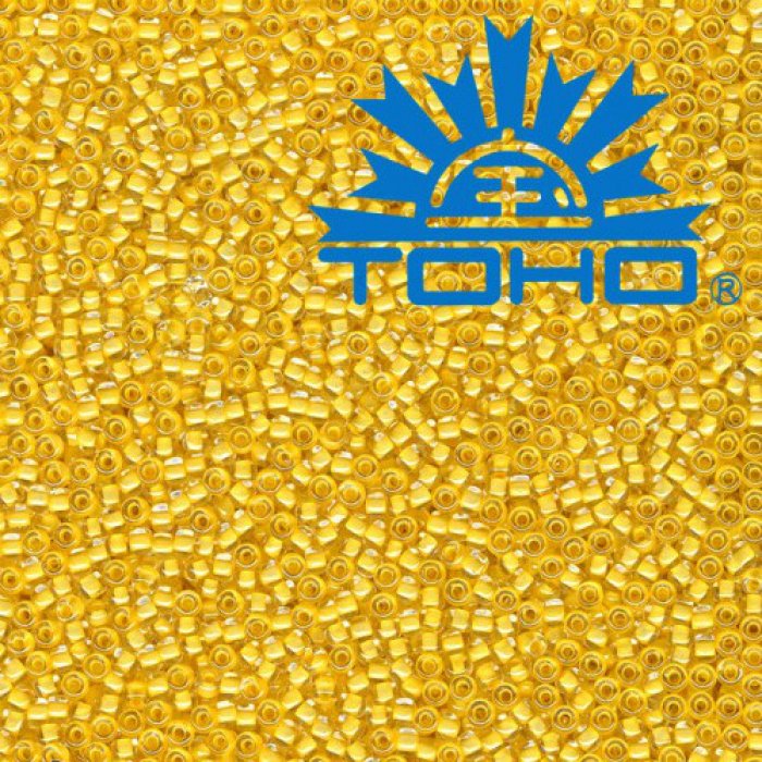 Toho Rokajl 11/0 - Inside-Color Crystal/Butter Lined č.961 25g